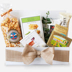 Gift box with snacks and Godiva chocolate on a white background