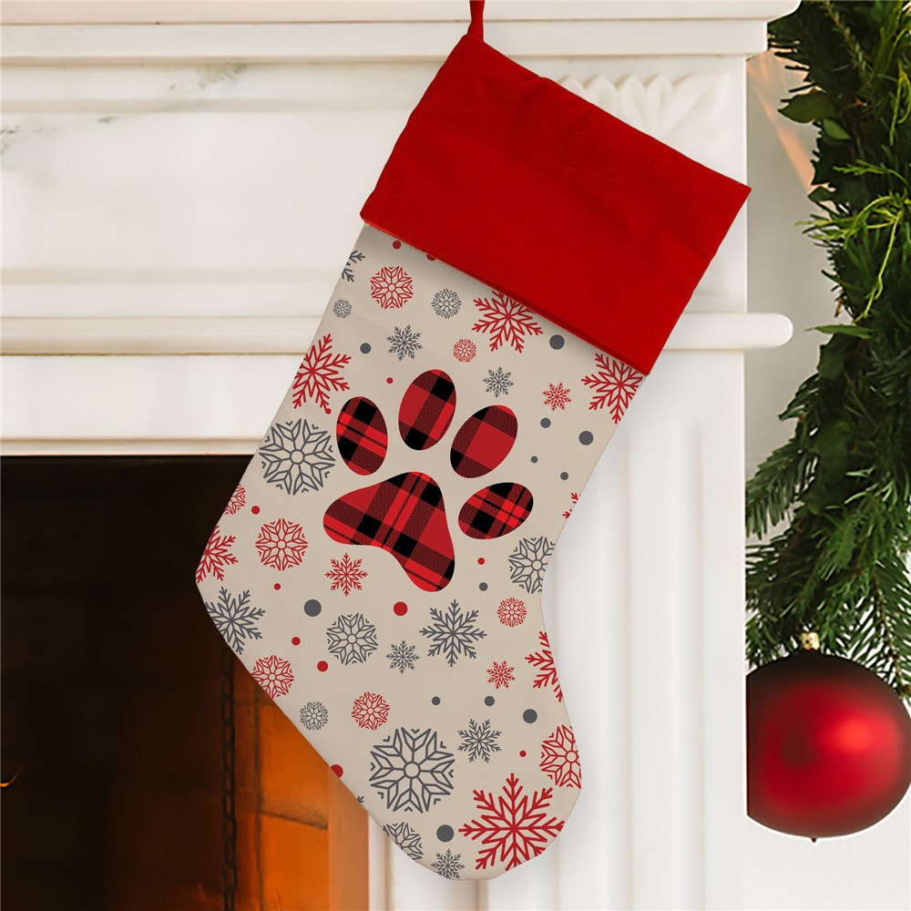 Red Plaid Paw Print surrounded by snowflakes Stocking